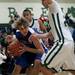 Pioneer senior William Kirchen is swarmed by Father Gabriel Richard players on Tuesday. Daniel Brenner I AnnArbor.com